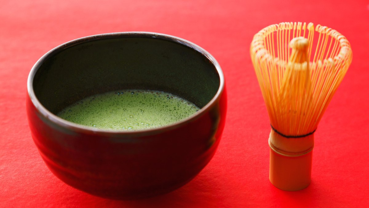 A bowl of bright green matcha
