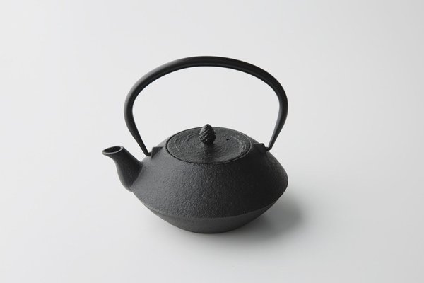 A black Nambu cast iron tetsubin kettle