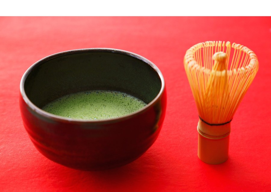 Tea in a dark glazed Japanese bowl